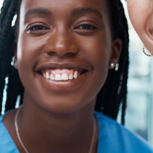 Smiling healthcare workers posing for a selfie